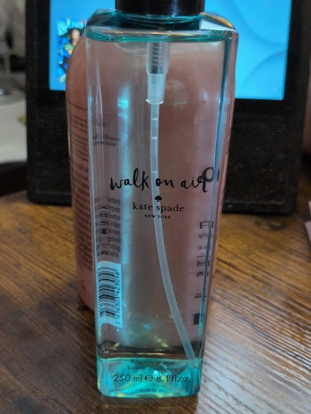 KATE SPADE Walk on Air fragrance mist — teal and pink bottle
